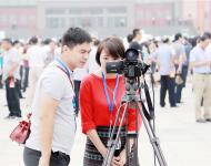 驻马店广播电视台记者在开幕式现场