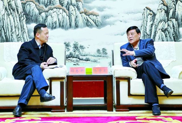 余学友会见新华社河南分社社长孙志平一行