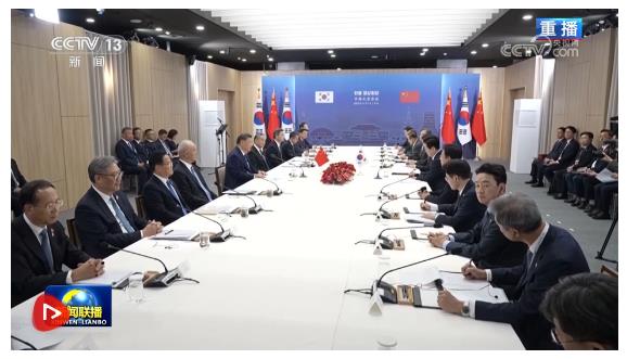 习近平同韩国总统李在明会谈